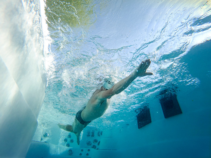 Ben Hoffman Swimming in a challenger series h2x swim spa by master spas